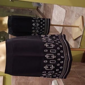 Ann Taylor Lift Black skirt with stitching design.  Size 4p